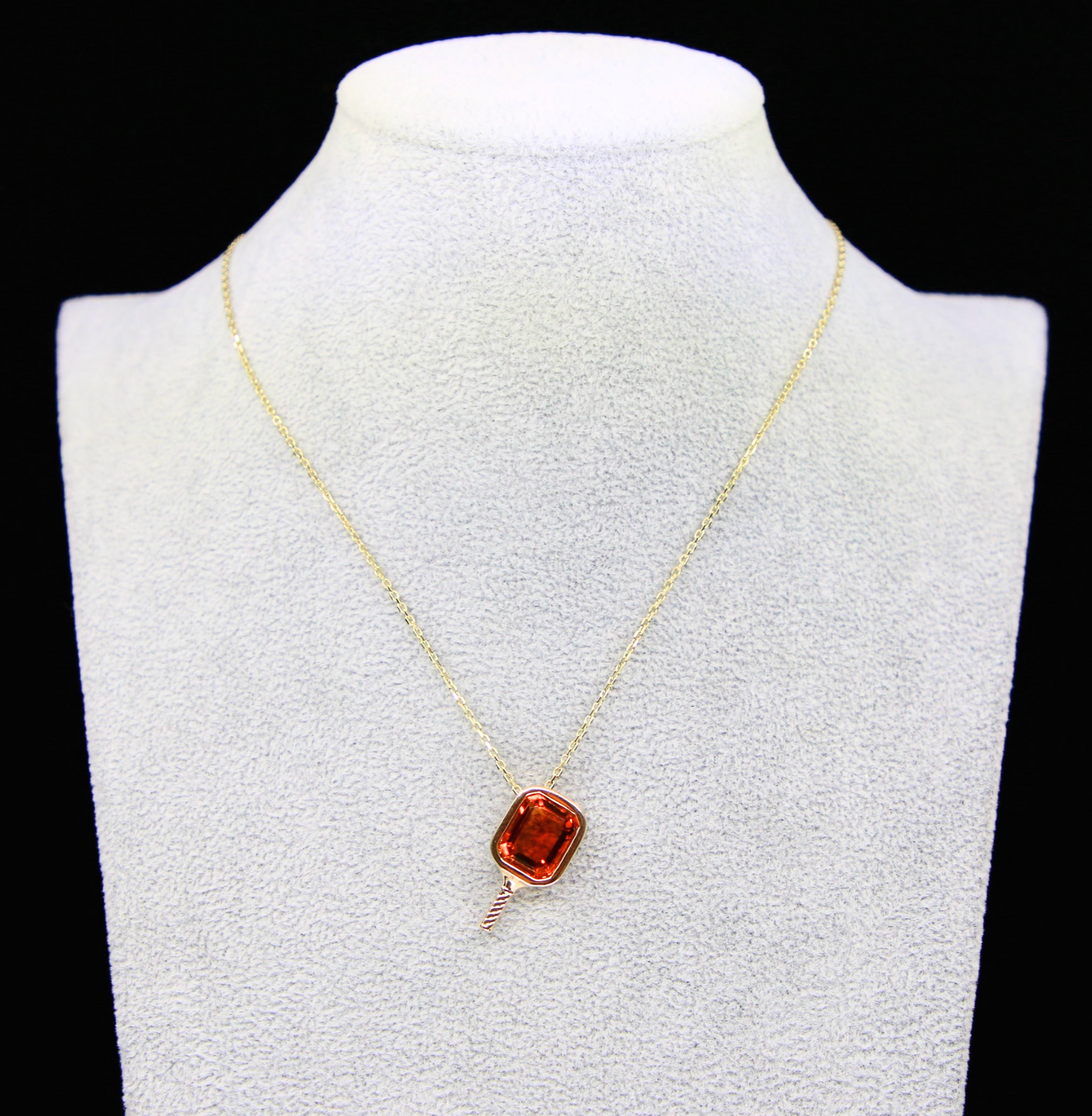 Necklace set with a orange natural citrine gemstone in a pickleball paddle pendant